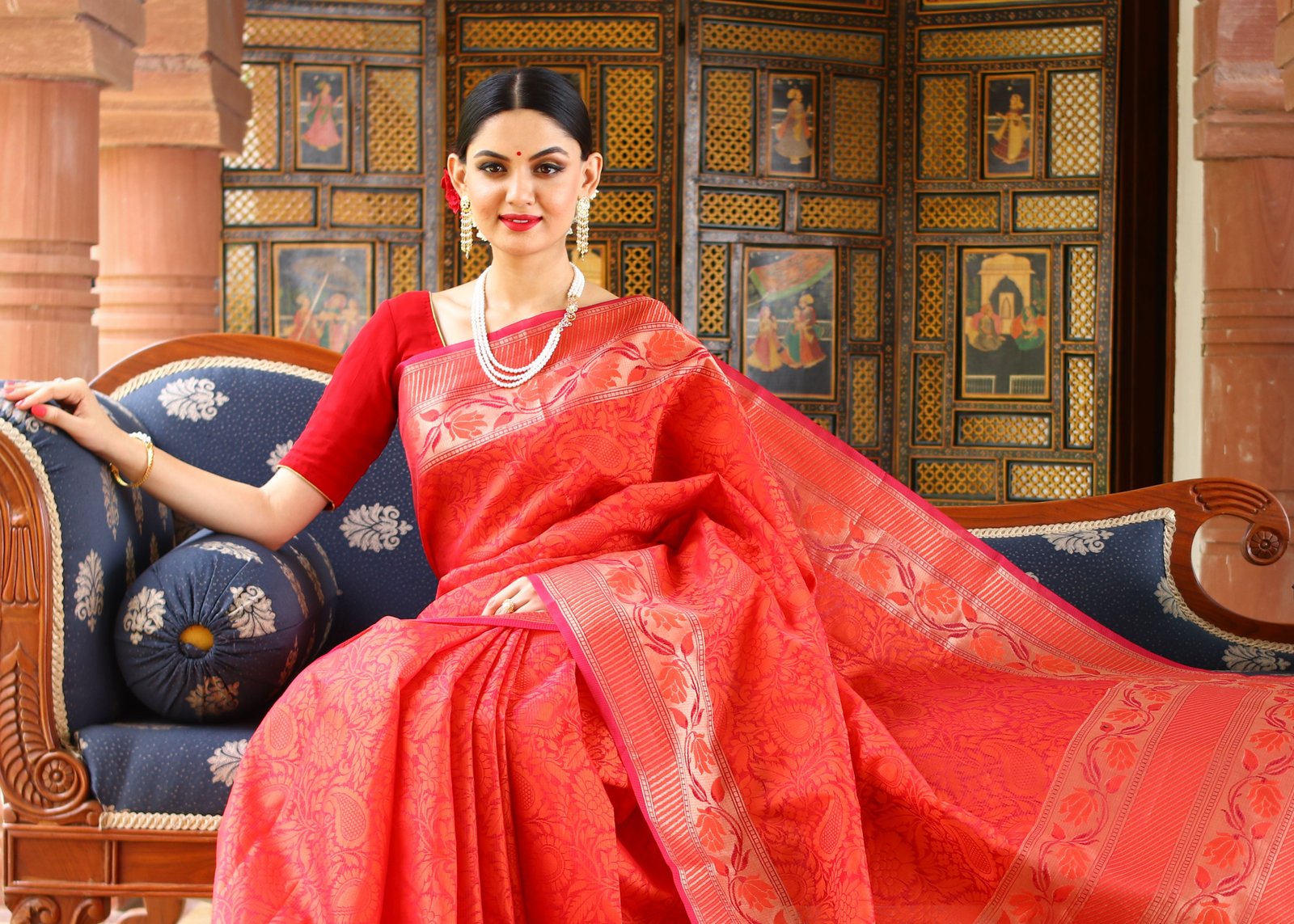Scarlet silk saree with royal zari embellishment